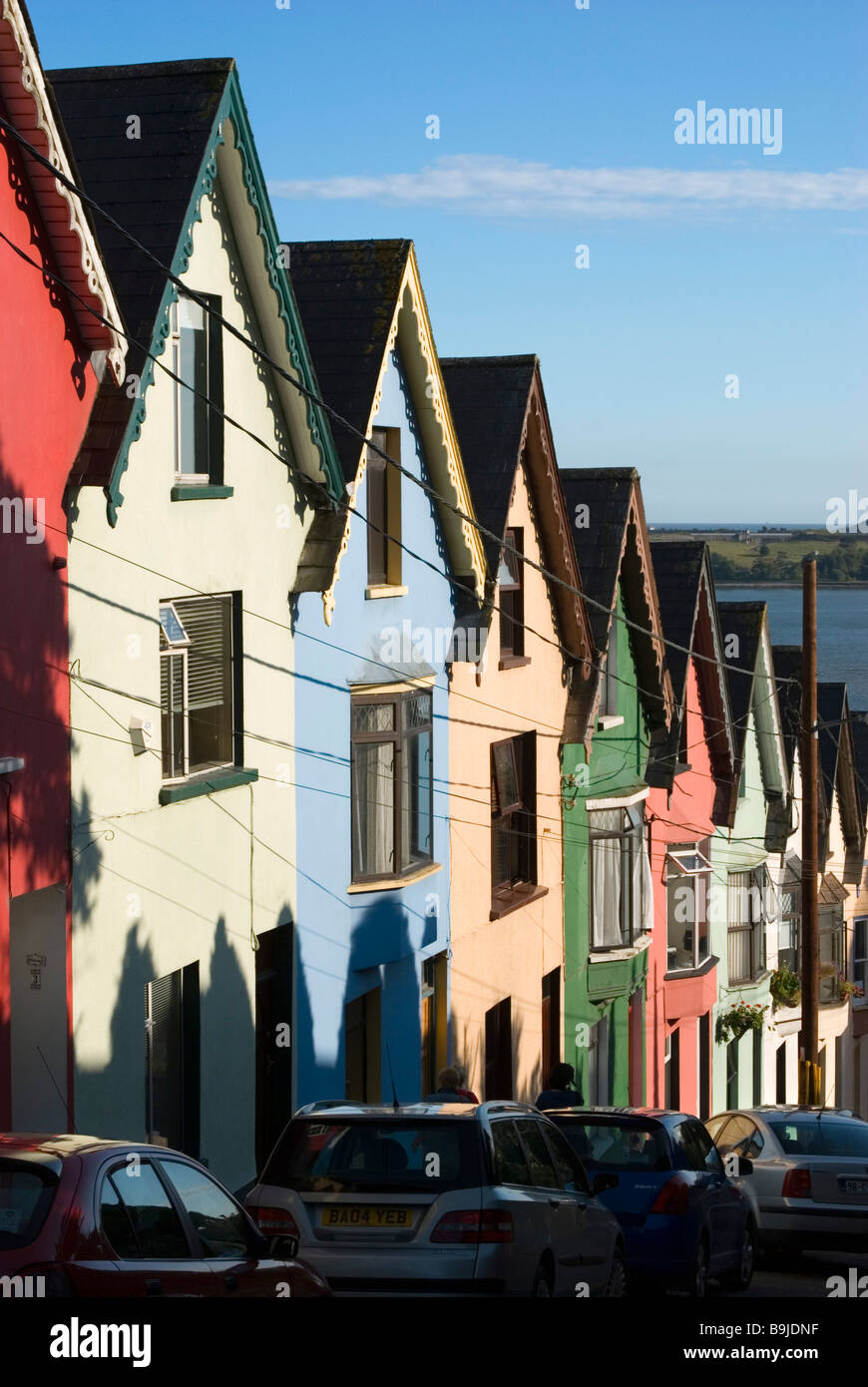 A colourful row of houses known locally as The Deck of Cards are situated on a very steep hill in Cobh, County Cork, Ireland Stock Photo