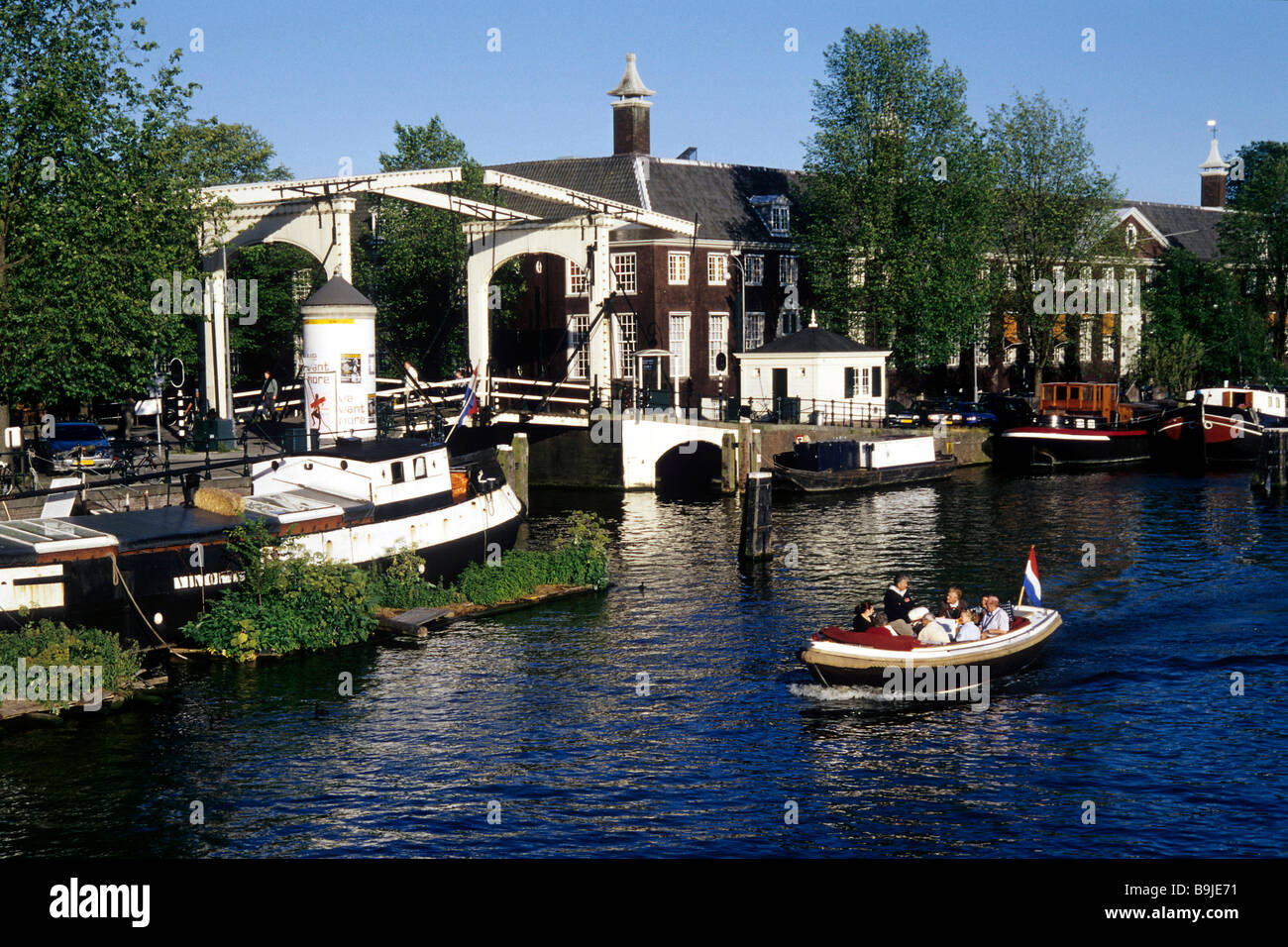 Walter Sueskind Brug, draw bridge, boats on Amstel River, Amsterdam, North Holland, Netherlands, Europe Stock Photo