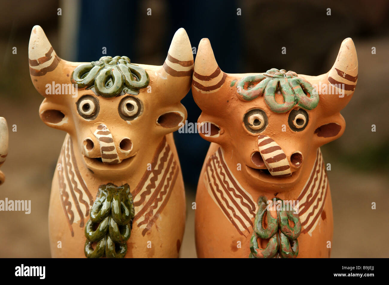 Clay bulls which are placed on roofs in southern peru as a symbol of ...