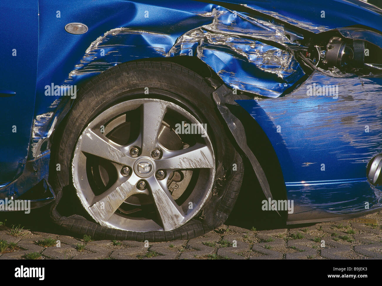 Accident-car blue car body damage sidewards detail car passenger car ambulances accident traffic-accident car accident damage Stock Photo