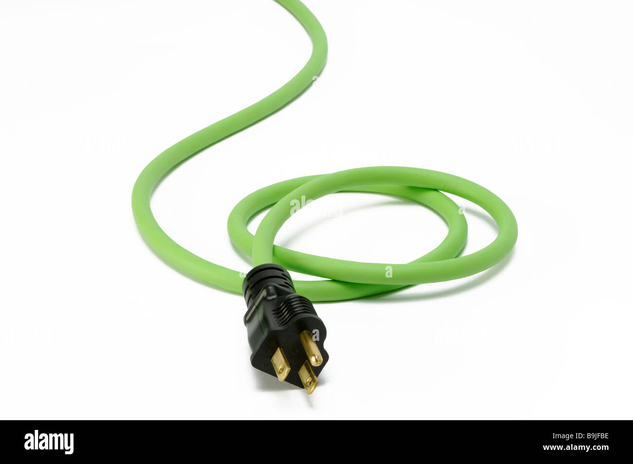 The end plug section of a green electrical extension power cord with one plug Stock Photo