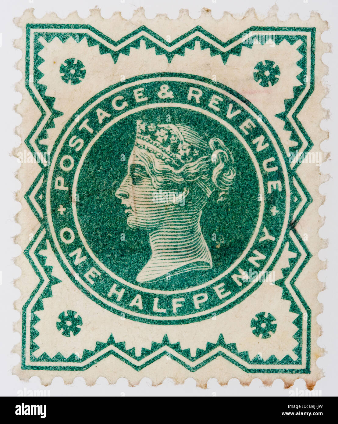 Close up of ½d, one half penny green Victorian British Postal stamp on white background issued between 1887-1900, part of the 'Jubilee Issue'. Unused. Stock Photo