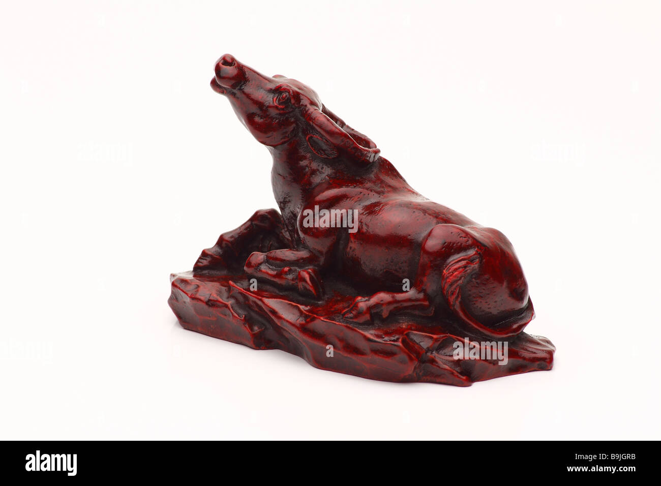 A bull made of Red Jasper stone. Stock Photo