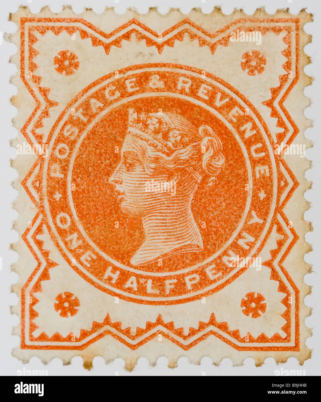 Close up of ½d, one half penny orange Victorian British Postal stamp on white background issued between 1887-1900, part of the 'Jubilee Issue'. Mint Stock Photo