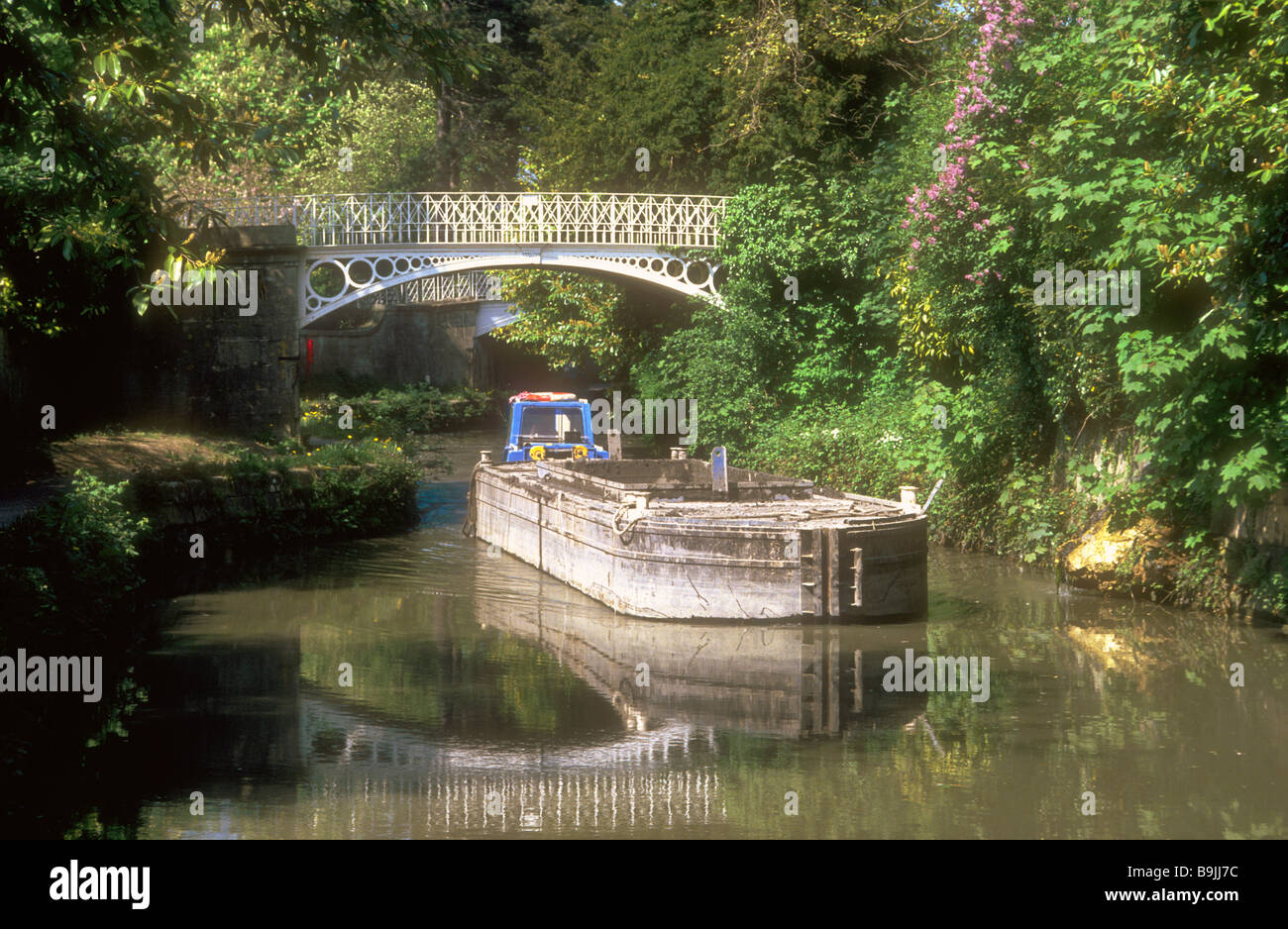 A British Waterways broad beam canal barge on the Kennet and Avon Canal at Sydney Gardens Bath Avon England UK Stock Photo