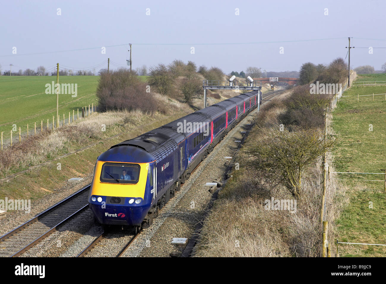 First Great Western HST lead by 43143 passes Bourton Wiltshire with a London Paddington Swansea service on 21 03 09 Stock Photo