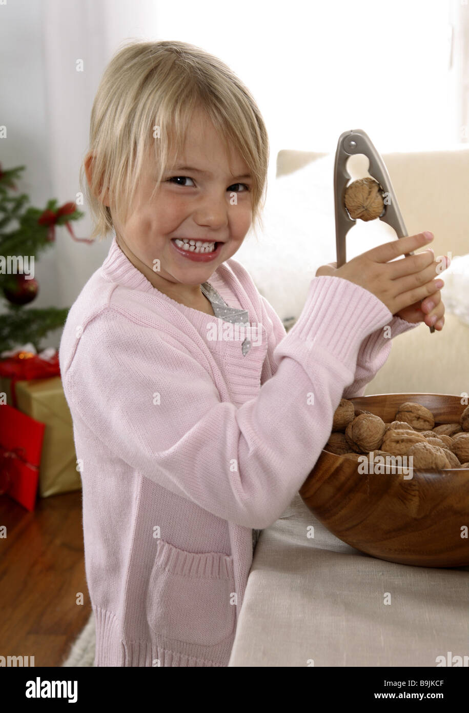 girl nutcrackers walnut opens Stock Photo Alamy