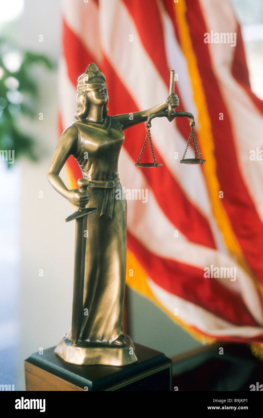 Statue justice blind blindfold scale American flag red white and blue