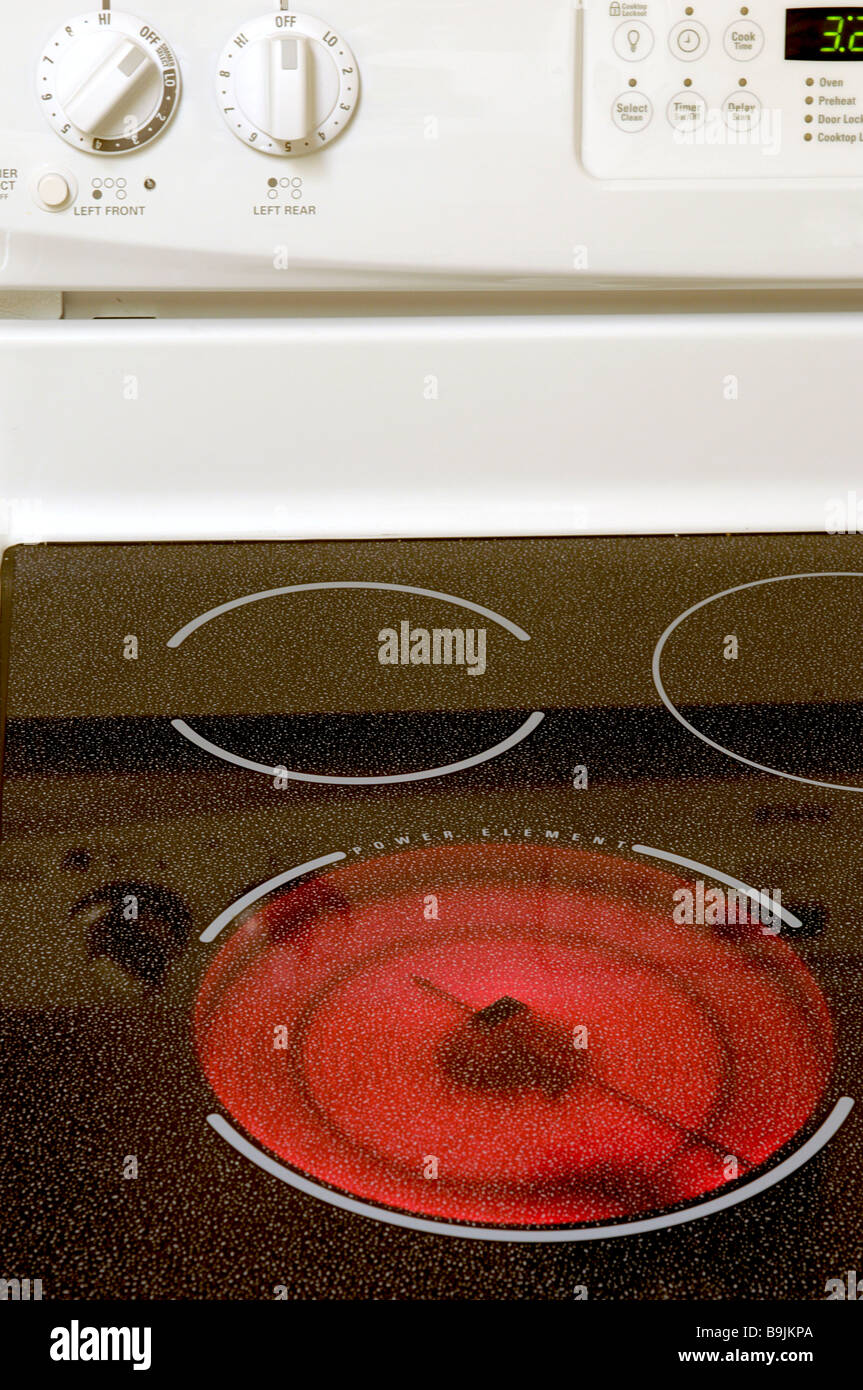 Stove top with one plate/element turned on. Stock Photo