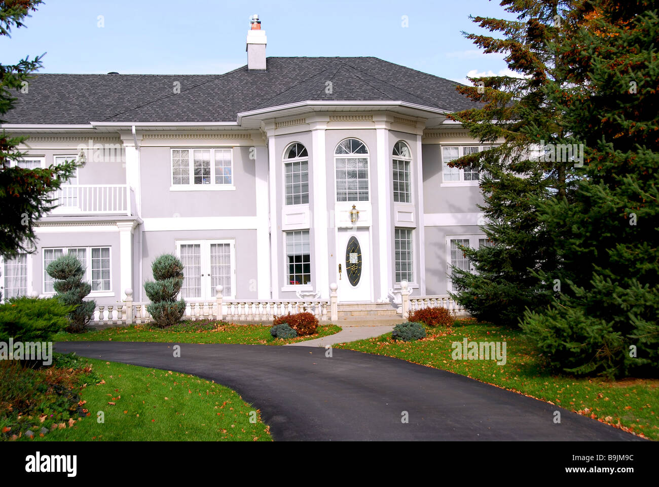 Beautiful mansion in grey and white color Stock Photo