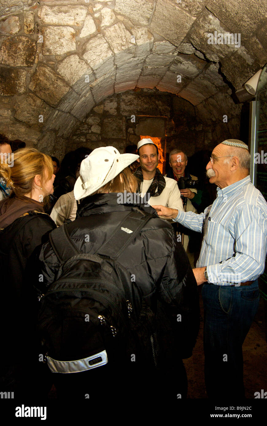 Professor Dan Bahat giving guided tour of labyrinth of tunnels and galleries in archaeological excavation under Western Wall Stock Photo