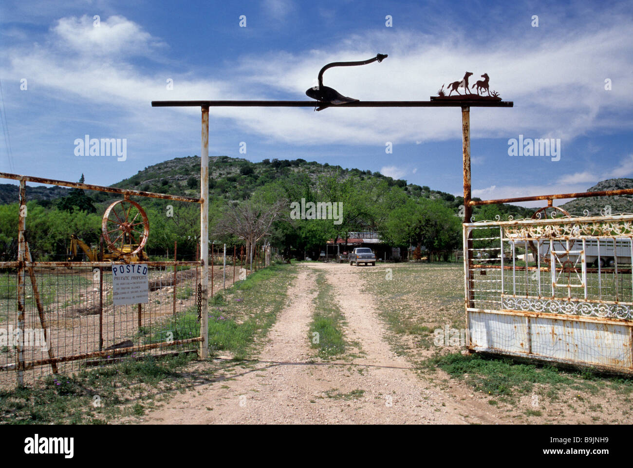 Wrought iron ranch gate in Juno at Edwards Plateau in Val Verde County Texas USA Stock Photo