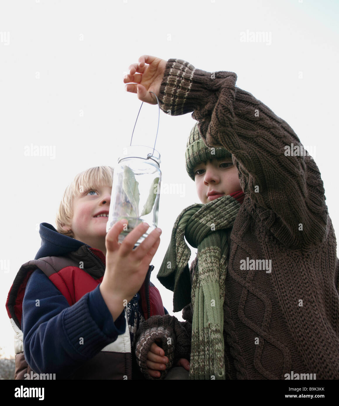 Inspecting Insect Children insects jar hi-res stock photography and images - Alamy