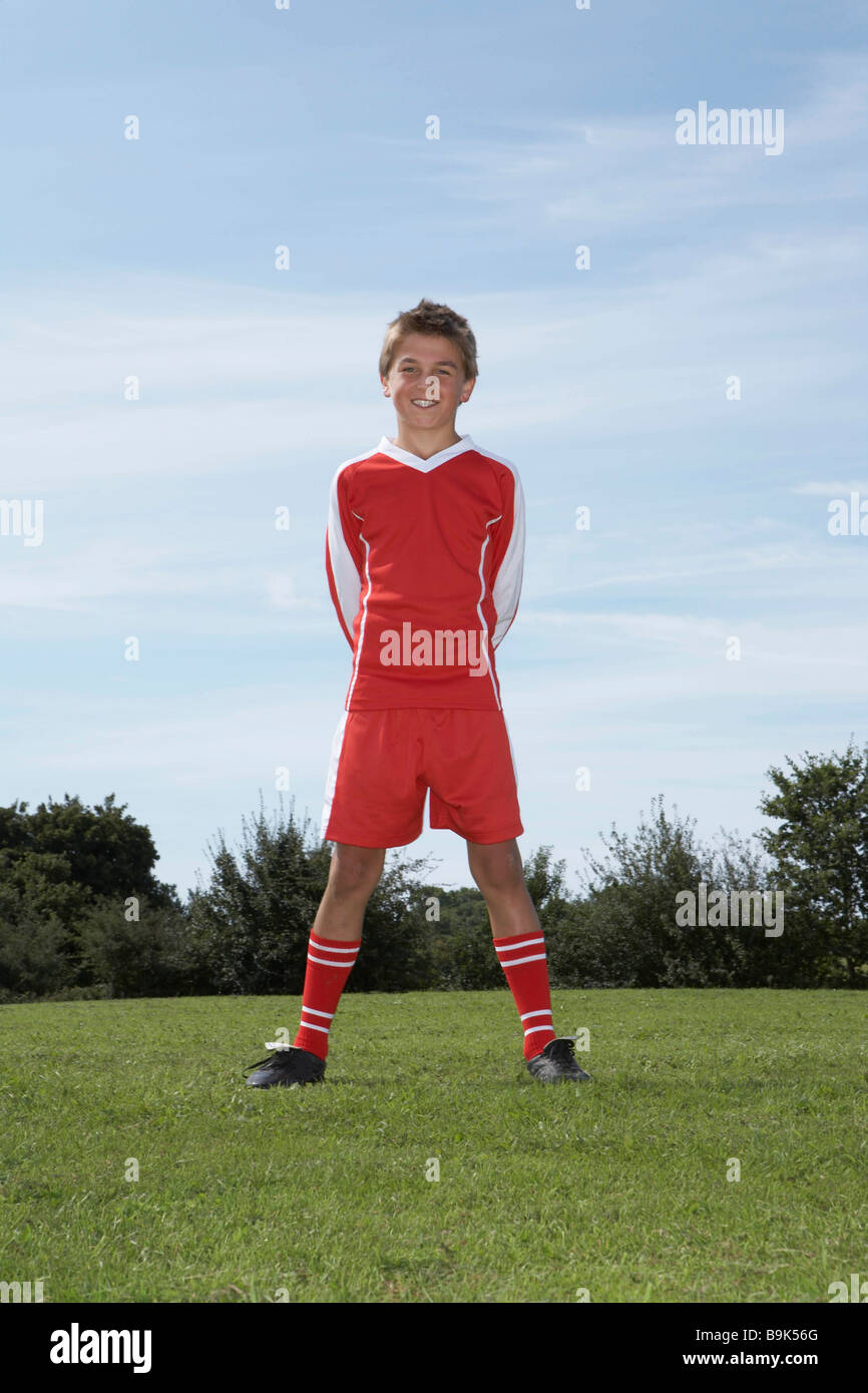 Young Male footballer standing Stock Photo