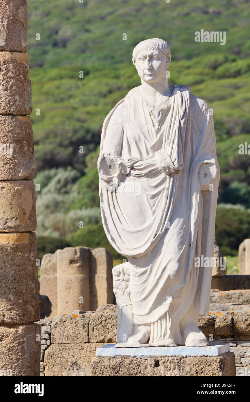 Roman ruins of Baelo Claudia at Bolonia Cadiz Province Spain Statue of the Emperor Trajan in the Basilica beside the Forum Stock Photo