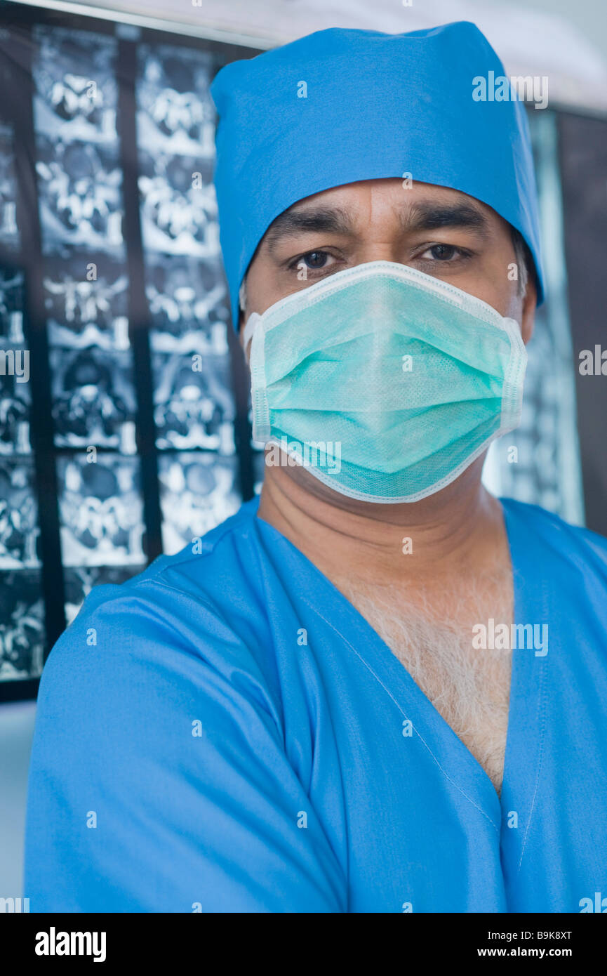 Portrait of a surgeon wearing a surgical mask Stock Photo