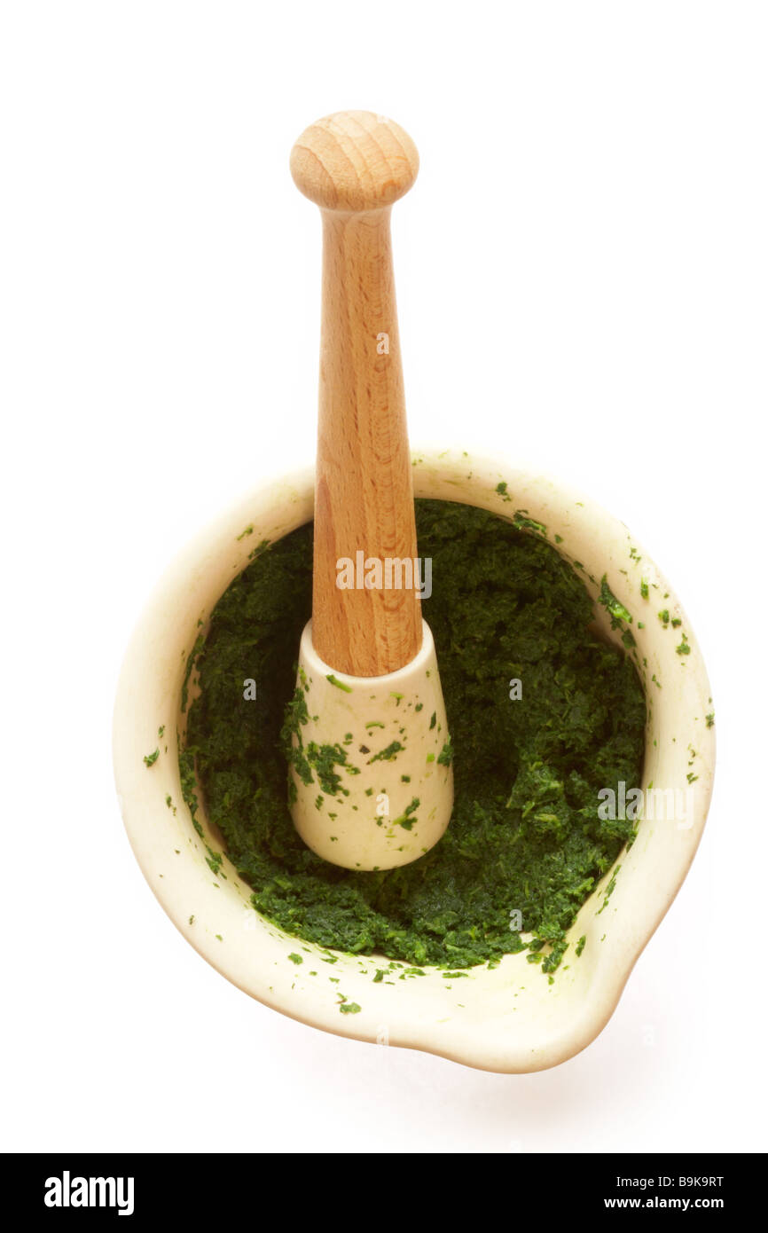 Green Pesto made in pestle and mortar Stock Photo Alamy