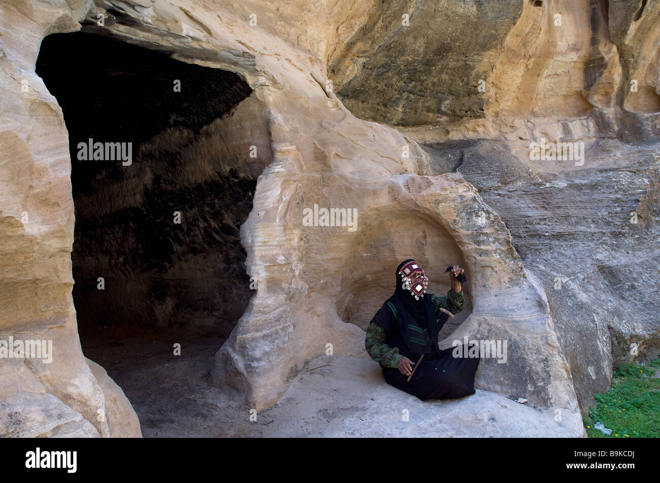 Jordan, Siq Al Barid, Nabaean city of Beida called The Little Petra, Bedouin woman Stock Photo