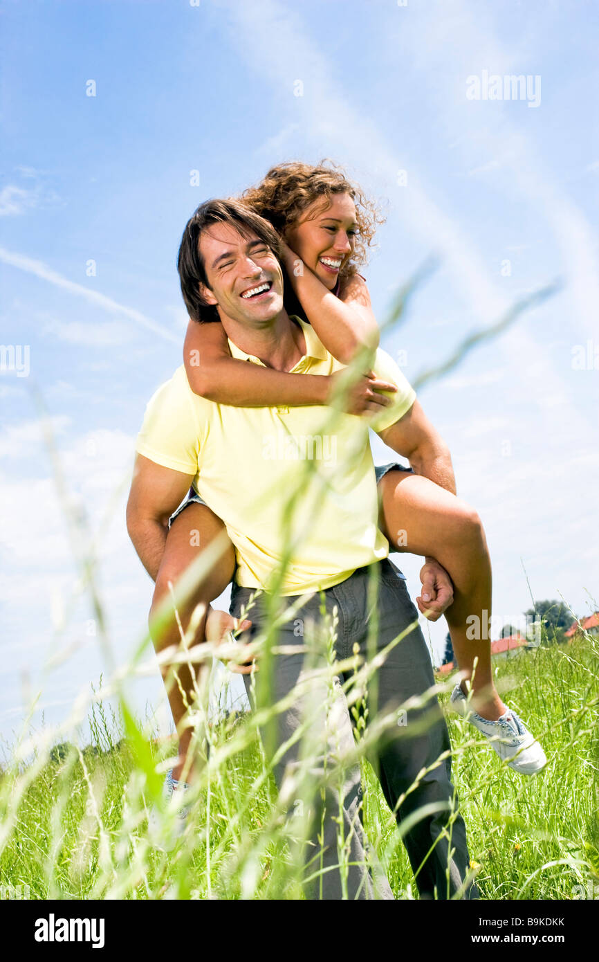 Midadult Caucasian Woman Giving Man Piggyback Stock Photo 3194063