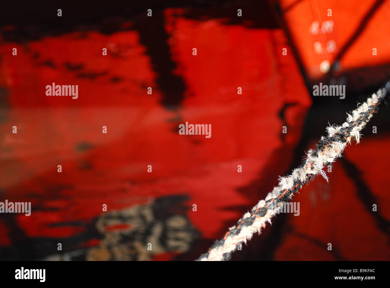 fish boat anchor reflect in the water Stock Photo - Alamy