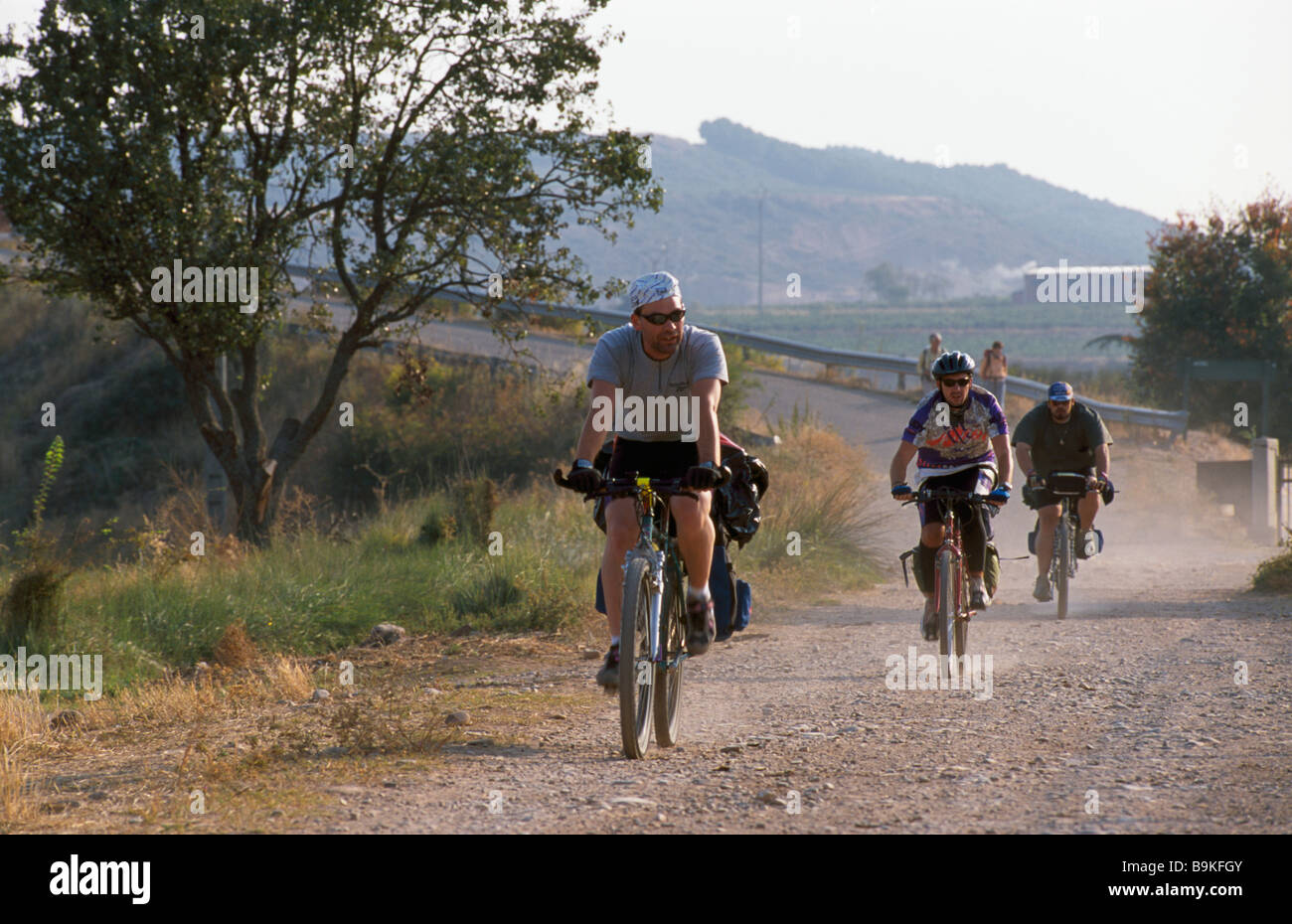Pilgrims cycling the Camino de Santiago at Navarette La Rioja Spain Rioja Alta Stock Photo