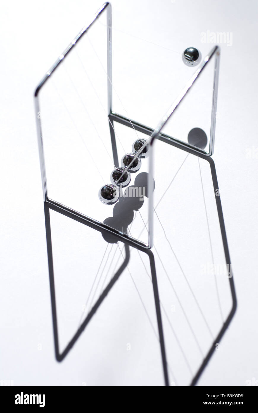 Newtons cradle Stock Photo