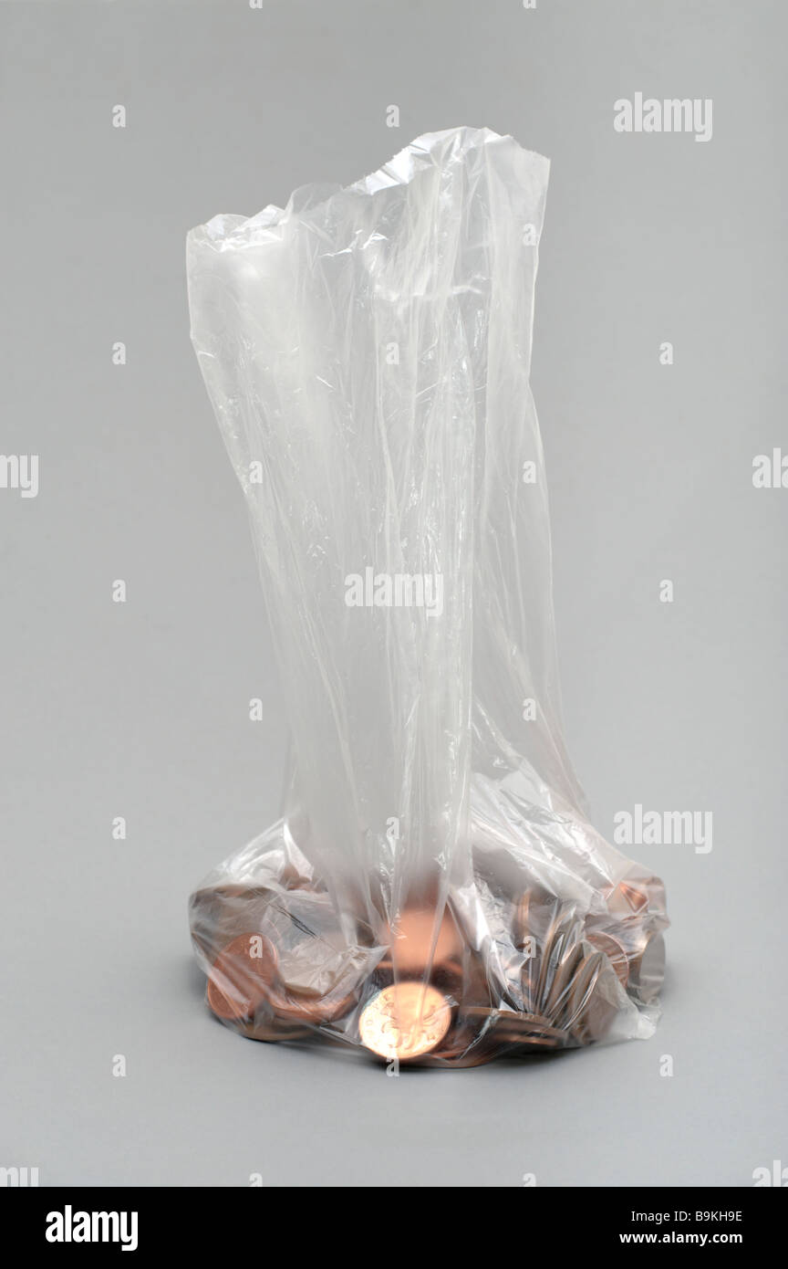 Plastic bag with British copper coins Stock Photo