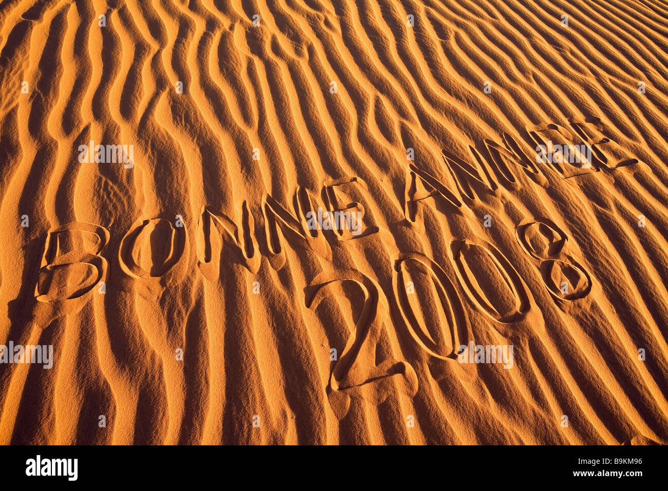 Mauritania, Adrar, Happy New Year 2008 written in the sand Stock Photo