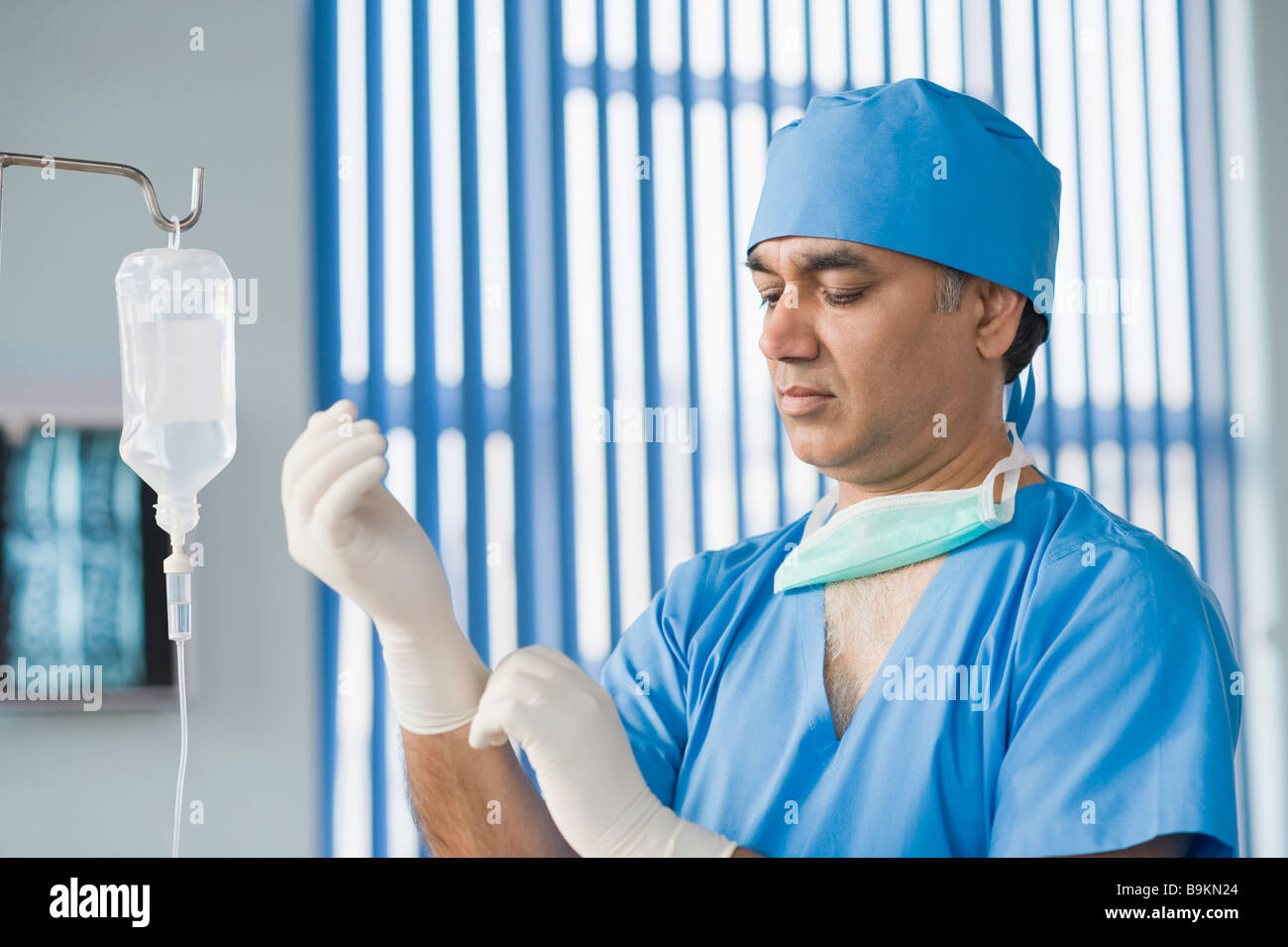Wearing surgical gloves hires stock photography and images Alamy