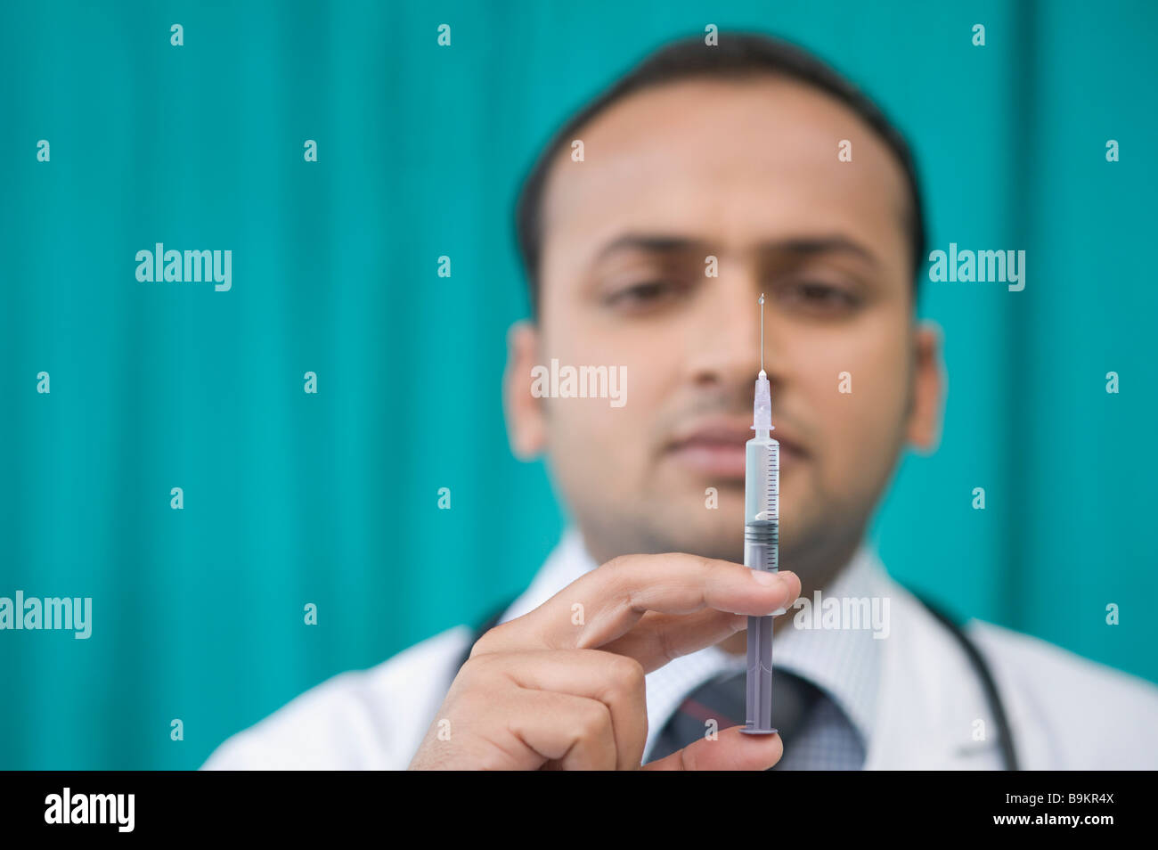 One indian doctor injection hi-res stock photography and images - Alamy