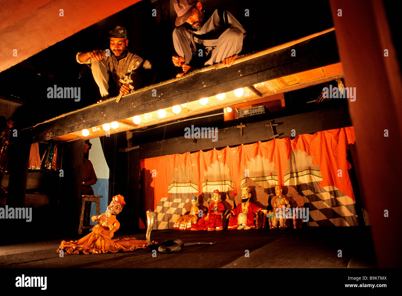 India, Rajasthan State, Udaipur, puppet show with a snake charmer Stock Photo Alamy