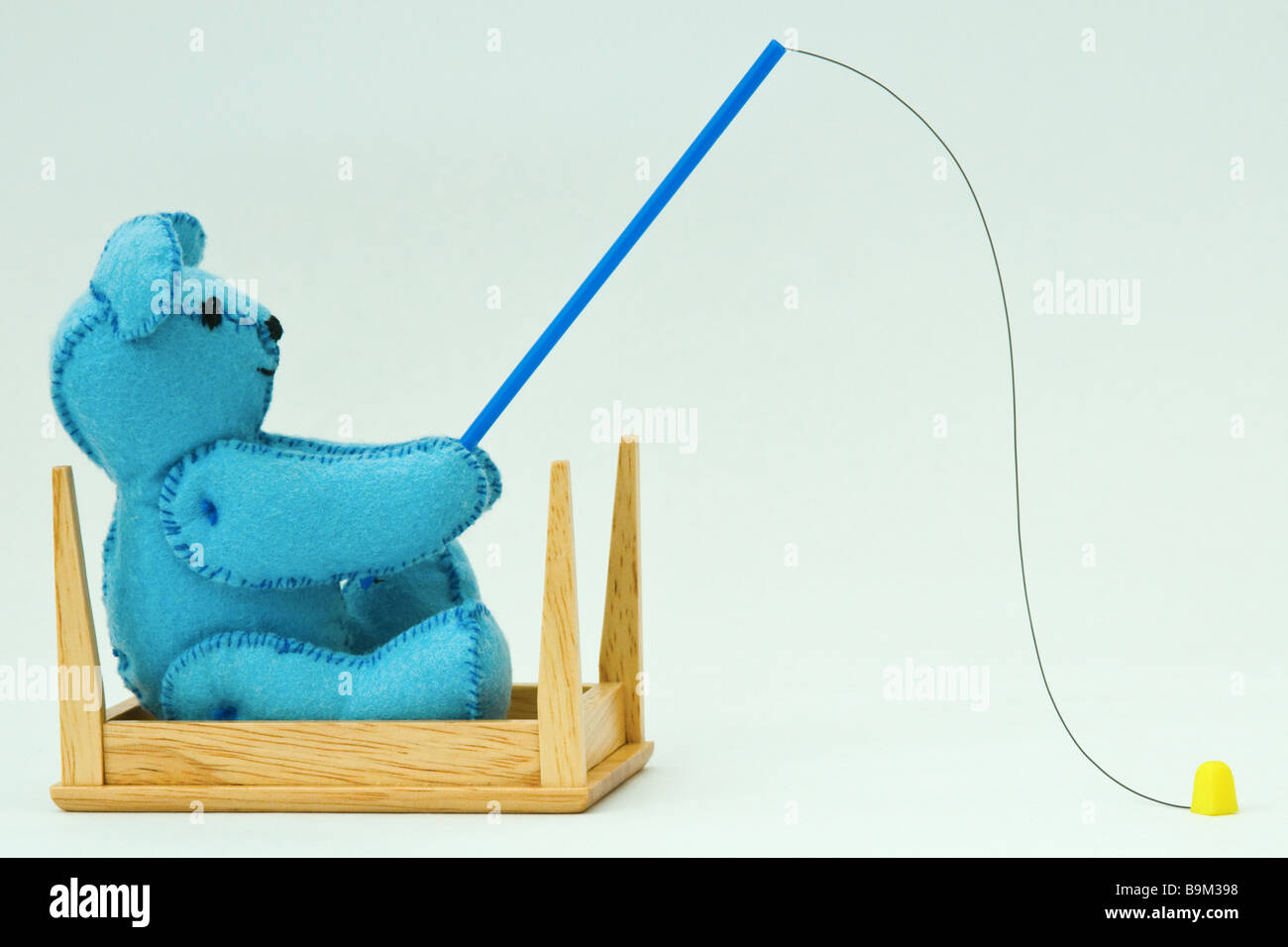 Miniature teddy bear fishing (Mini Bear Collection Stock Photo Alamy