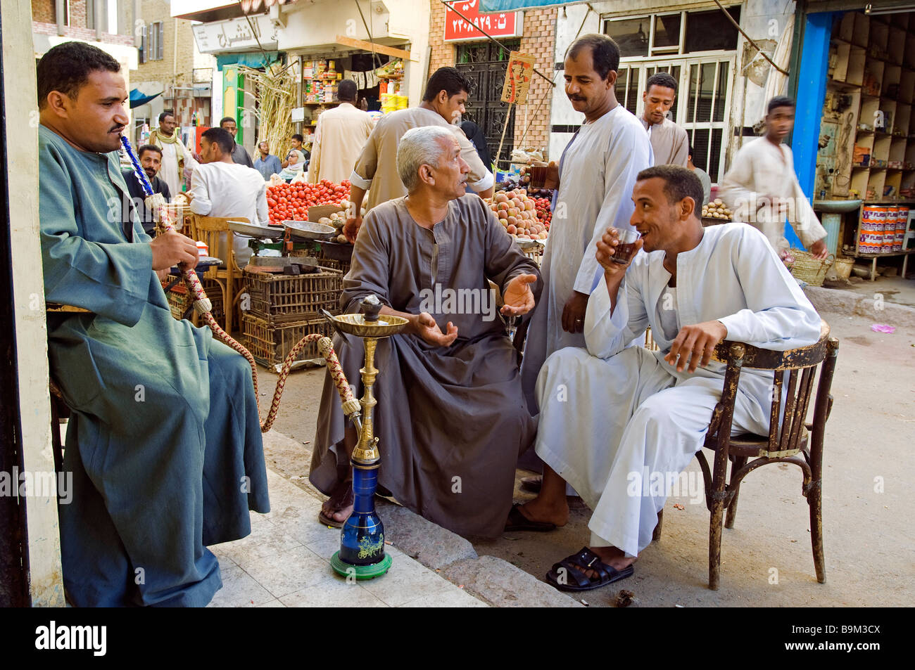 Egypt, Upper Egypt, Aswan, water pipe smoker (chicha) in the souk Stock Photo Alamy