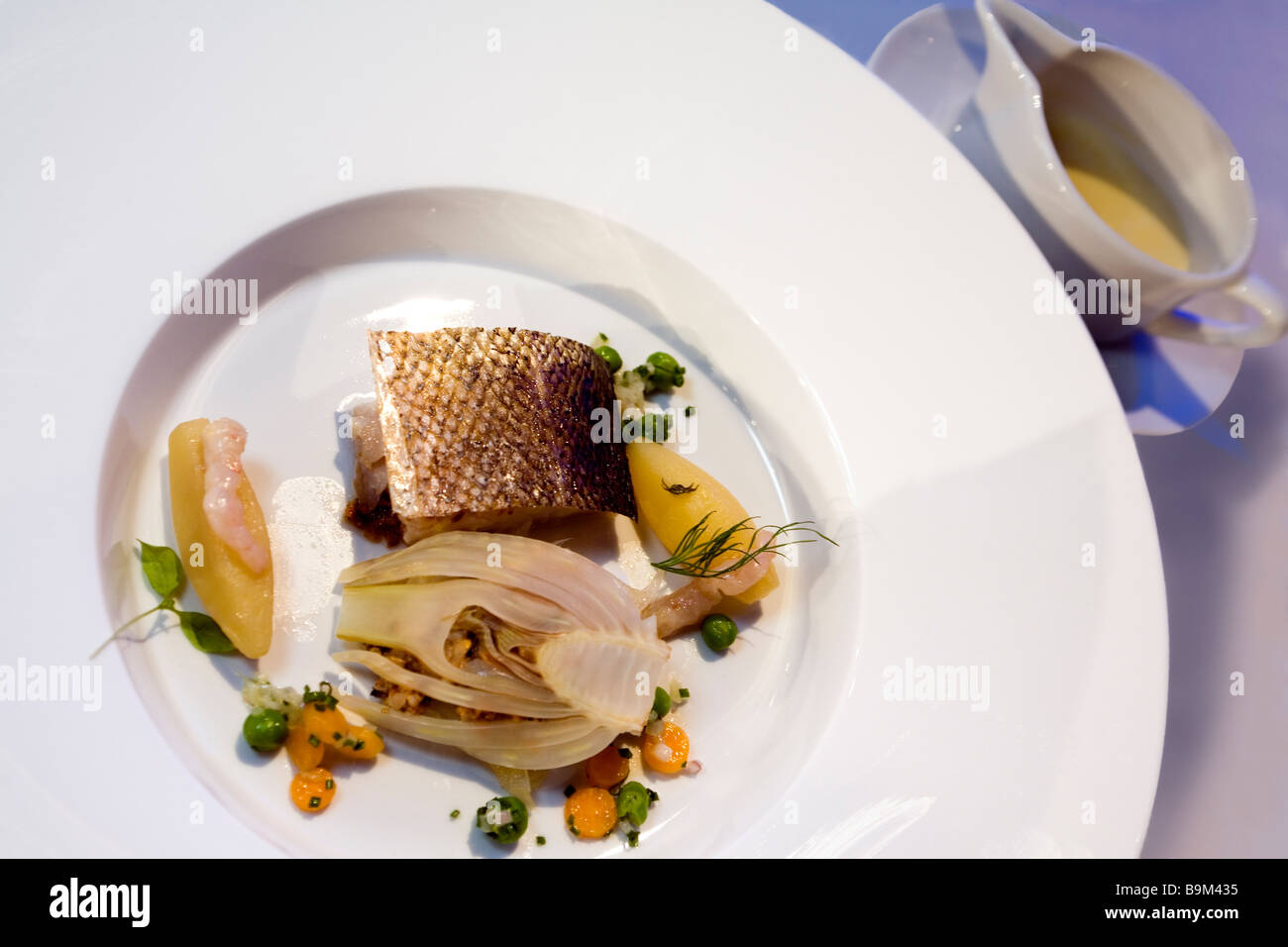 Served coalfish with citronette crispy crunchy skin Stock Photo - Alamy
