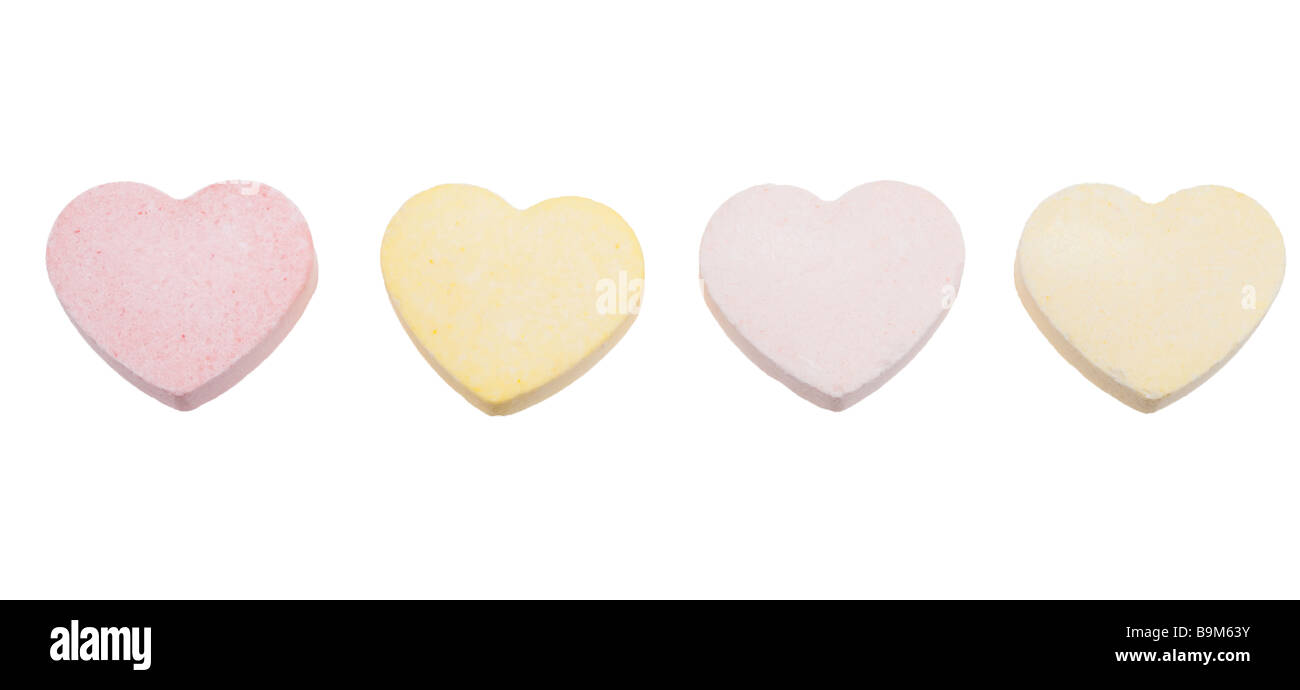 Assorted colors of blank candy hearts isolated on a white background Stock Photo