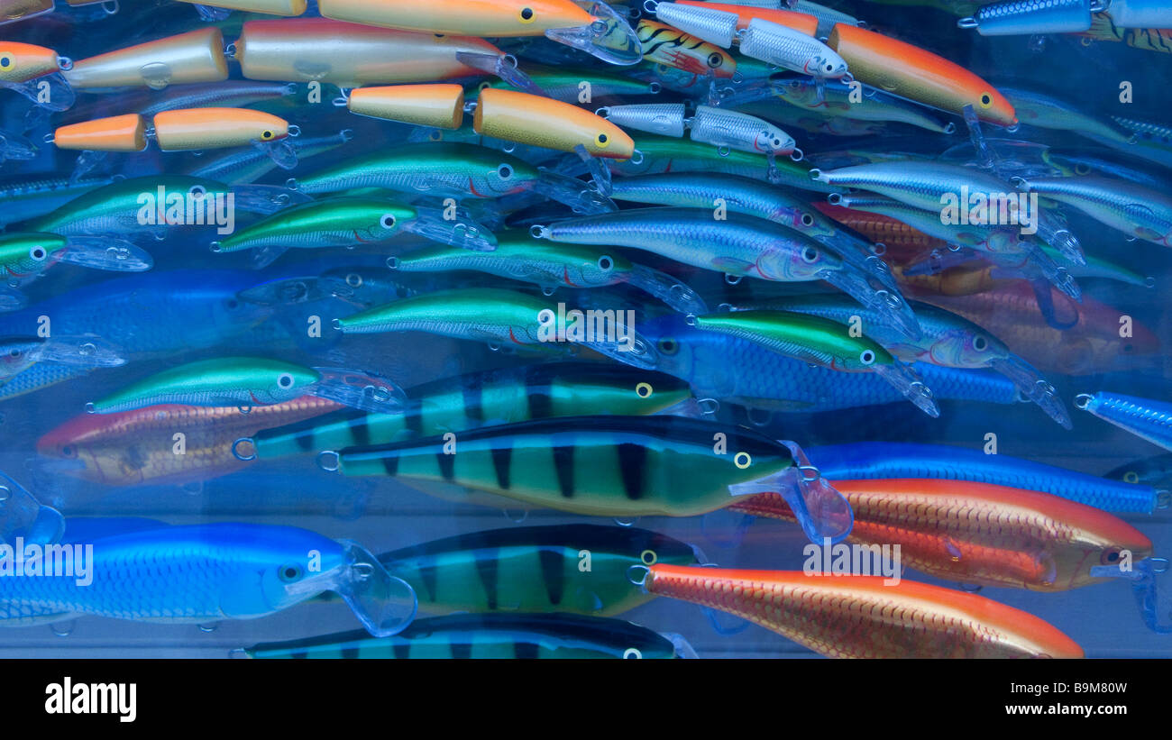 Shop display of colourful fishing lures and flies for anglers Stock Photo -  Alamy