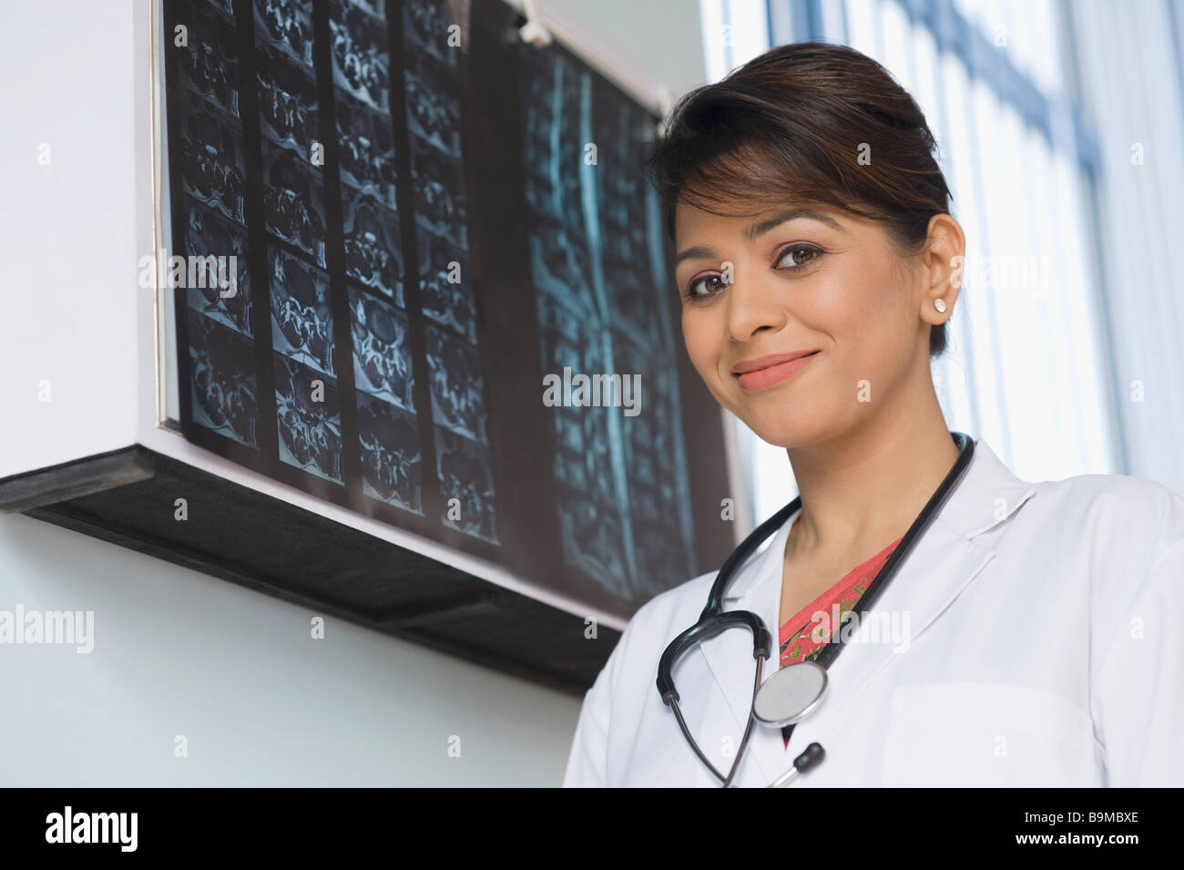 Portrait of a female doctor smiling Stock Photo