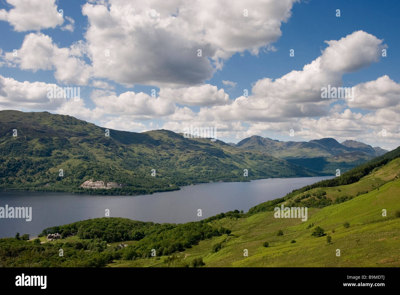 Loch Lomond and surrounding hills as viewed from Ben Lomond on a warm and sunny summer's day, Stirlingshire, Scotland Stock Photo