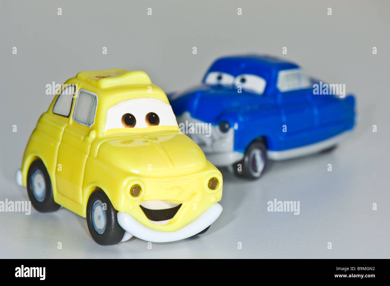 Plastic toy cars with smiling faces and eye Stock Photo Alamy