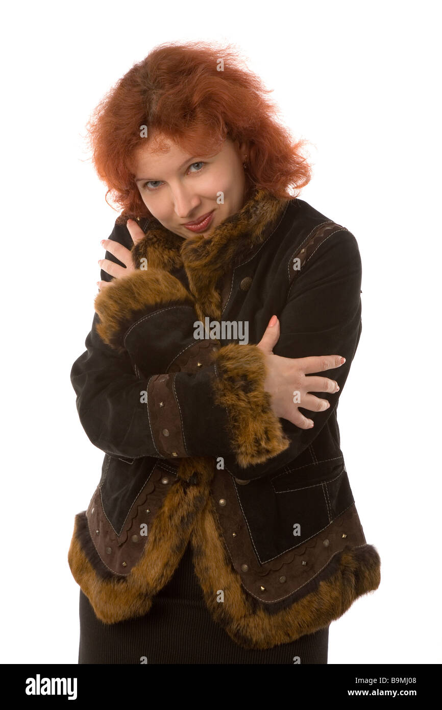 the young woman in sheepskin coat isolated on white background Stock ...