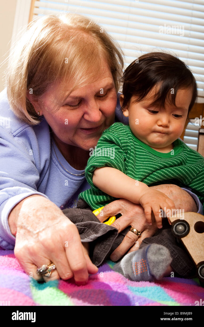 A ten month old baby playing Stock Photo Alamy