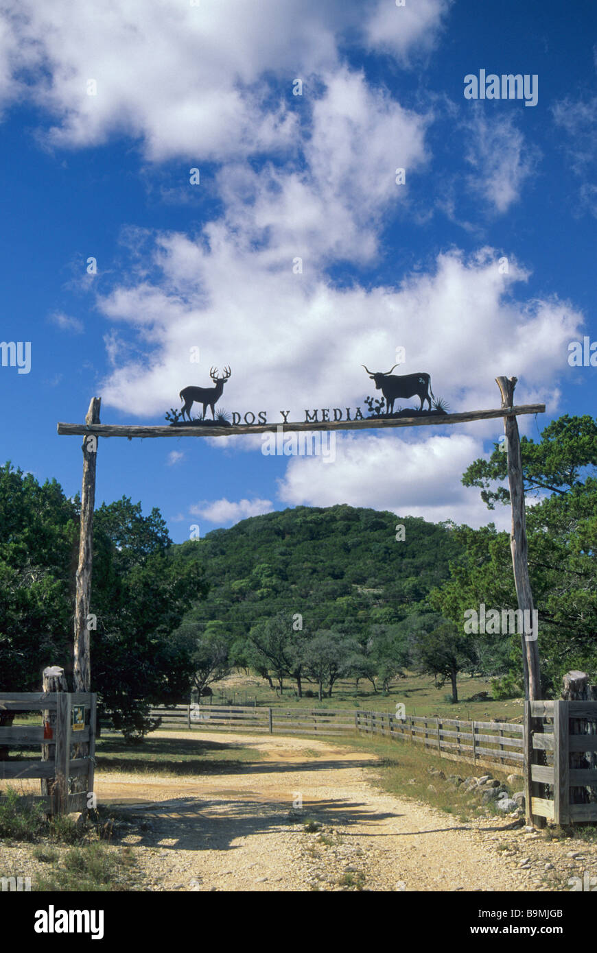 Wrought iron sign at ranch gate on FM 470 highway in the Hill Country near  Tarpley in Bandera County Texas USA Stock Photo - Alamy