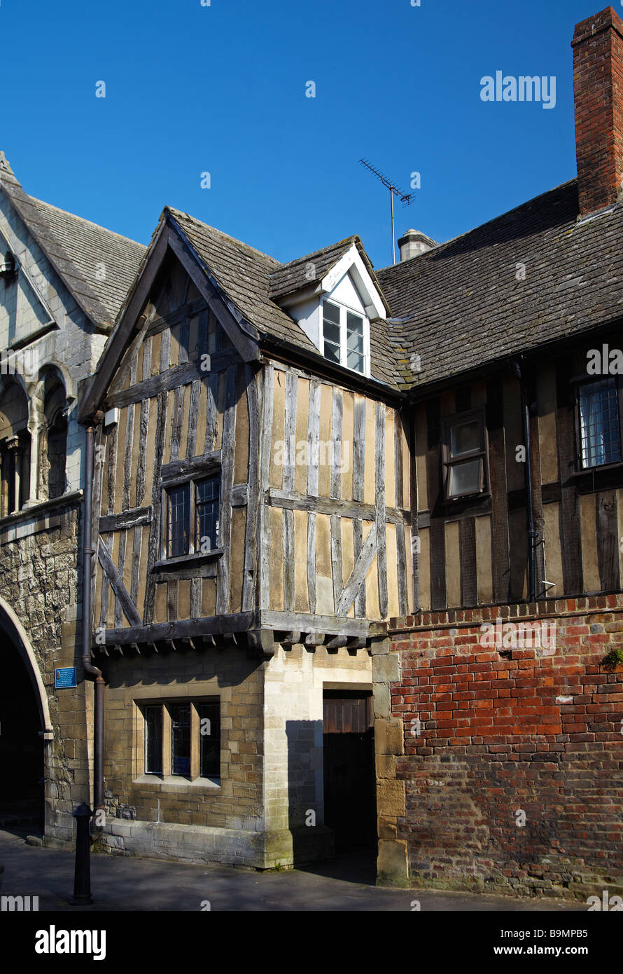 Half Timbered House, next to St. Mary's Gate, leading to Gloucester Cathedral. Gloucester, England, UK Stock Photo