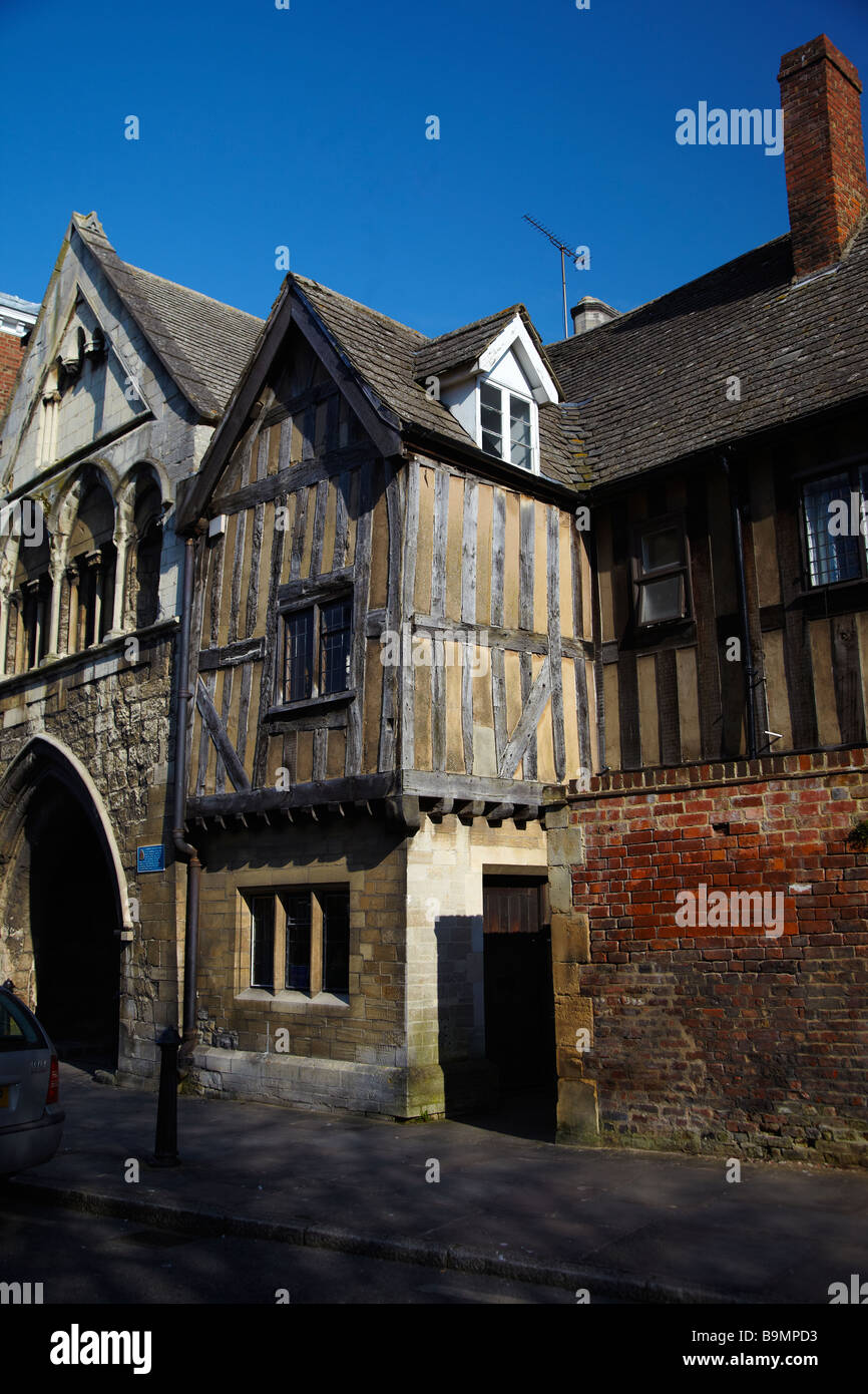 Half Timbered House, next to St. Mary's Gate, leading to Gloucester Cathedral. Gloucester, England, UK Stock Photo