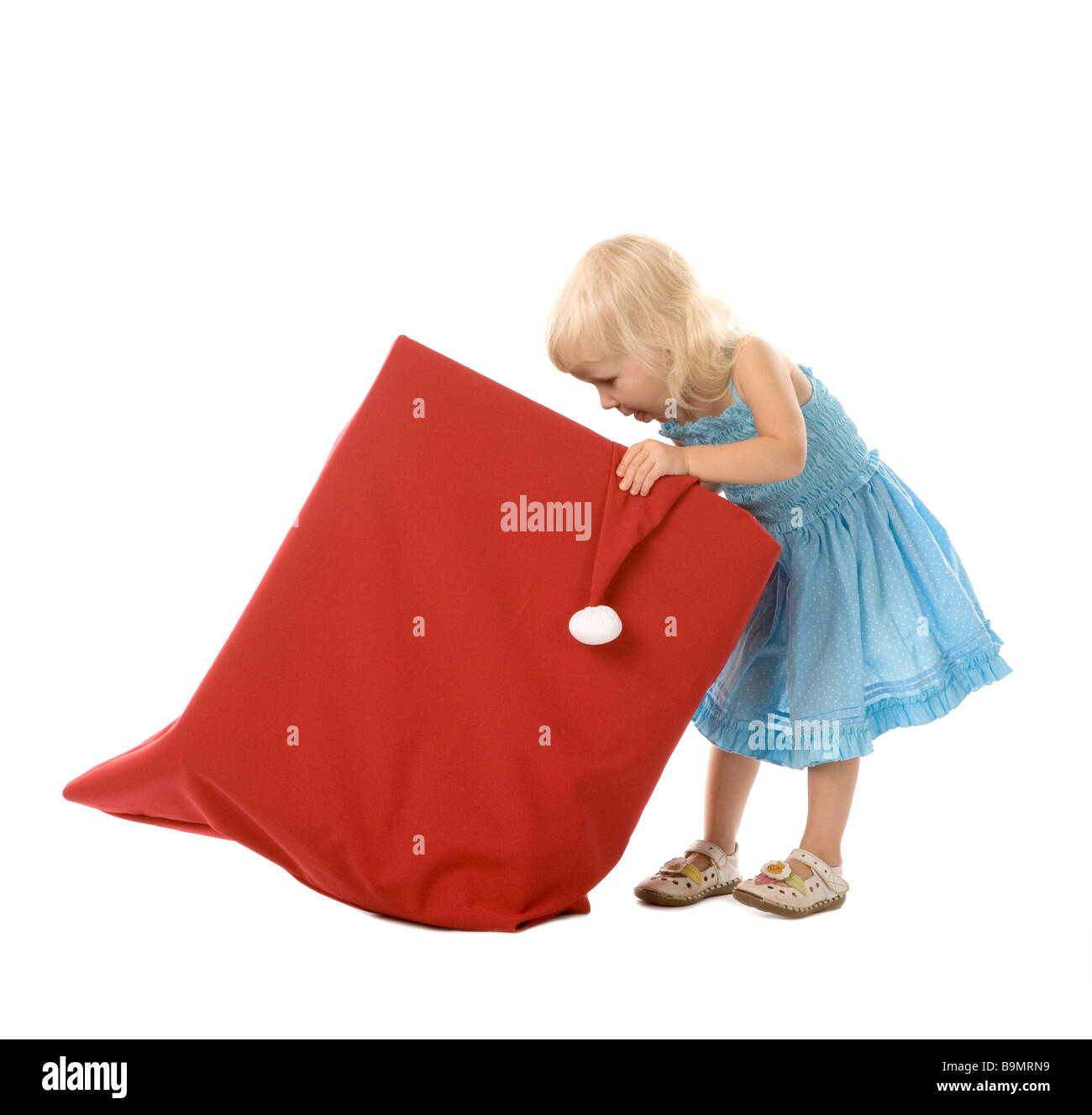 small girl and red box on white background Stock Photo - Alamy