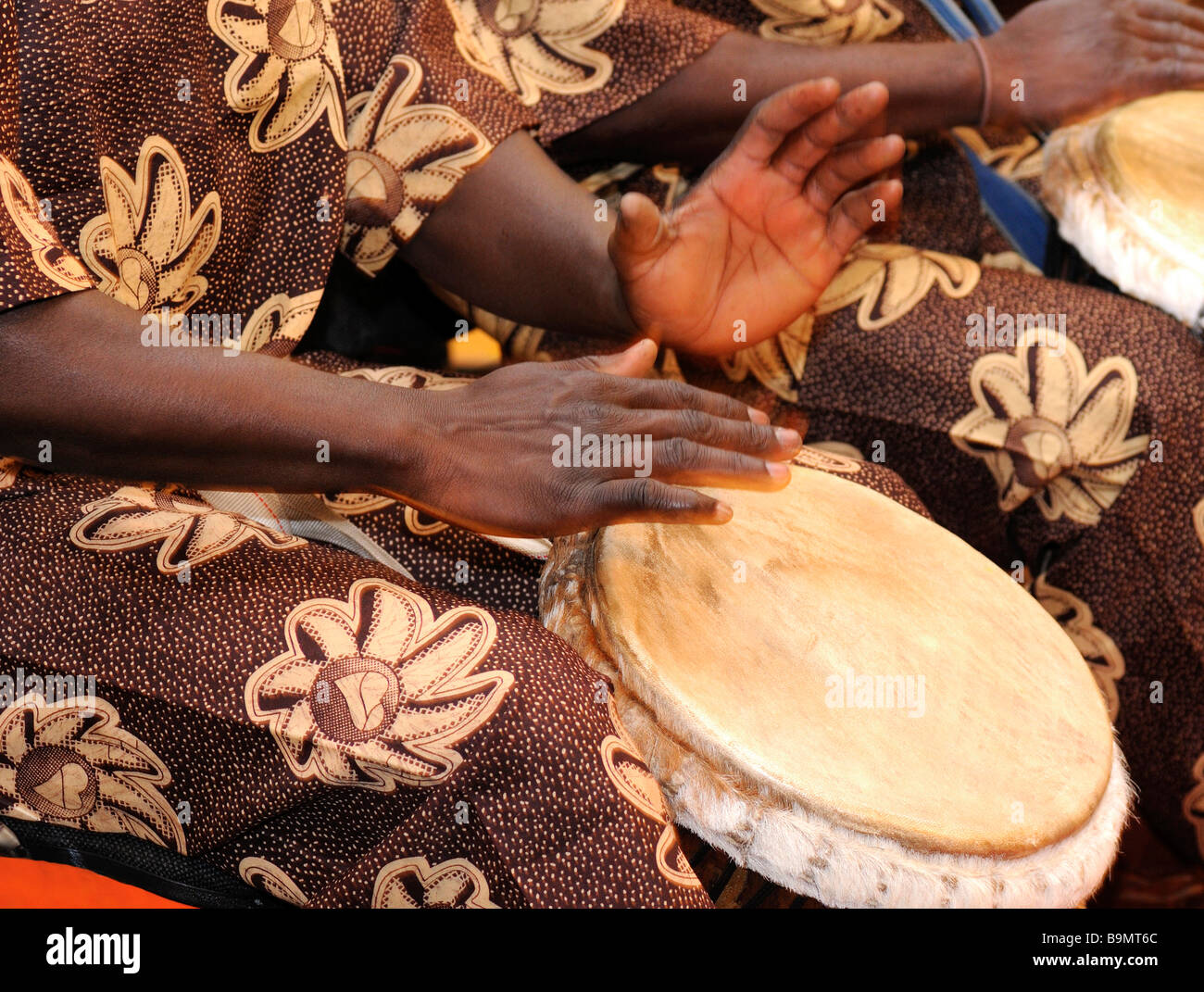 An African musician beating the drum Stock Photo Alamy