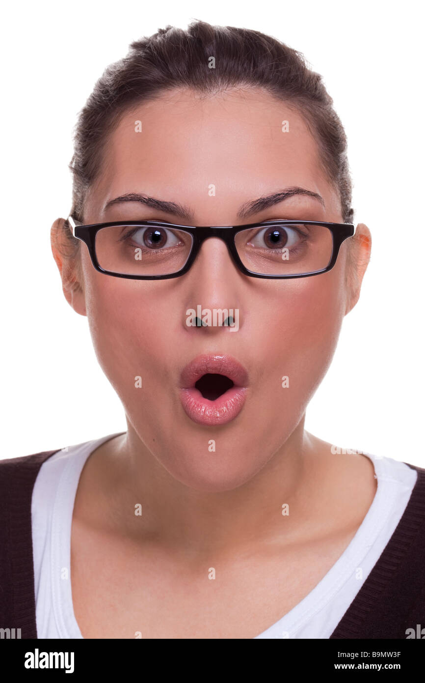 Attractive female with a shocked facial expression white background Stock Photo
