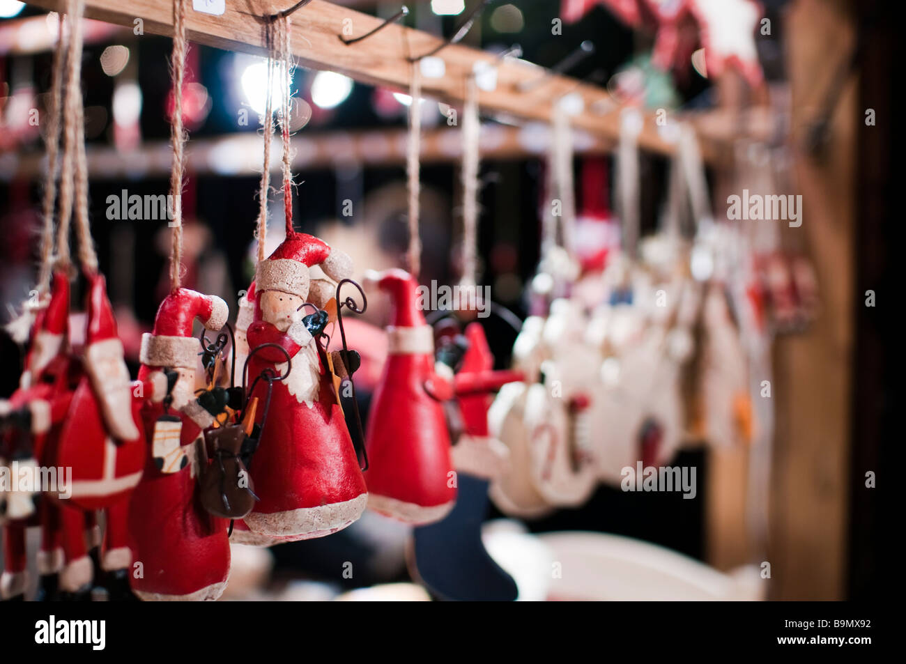 Handcrafted Santa Claus figures in the Strasbourg Christmas Market, known as the largest in France. Stock Photo