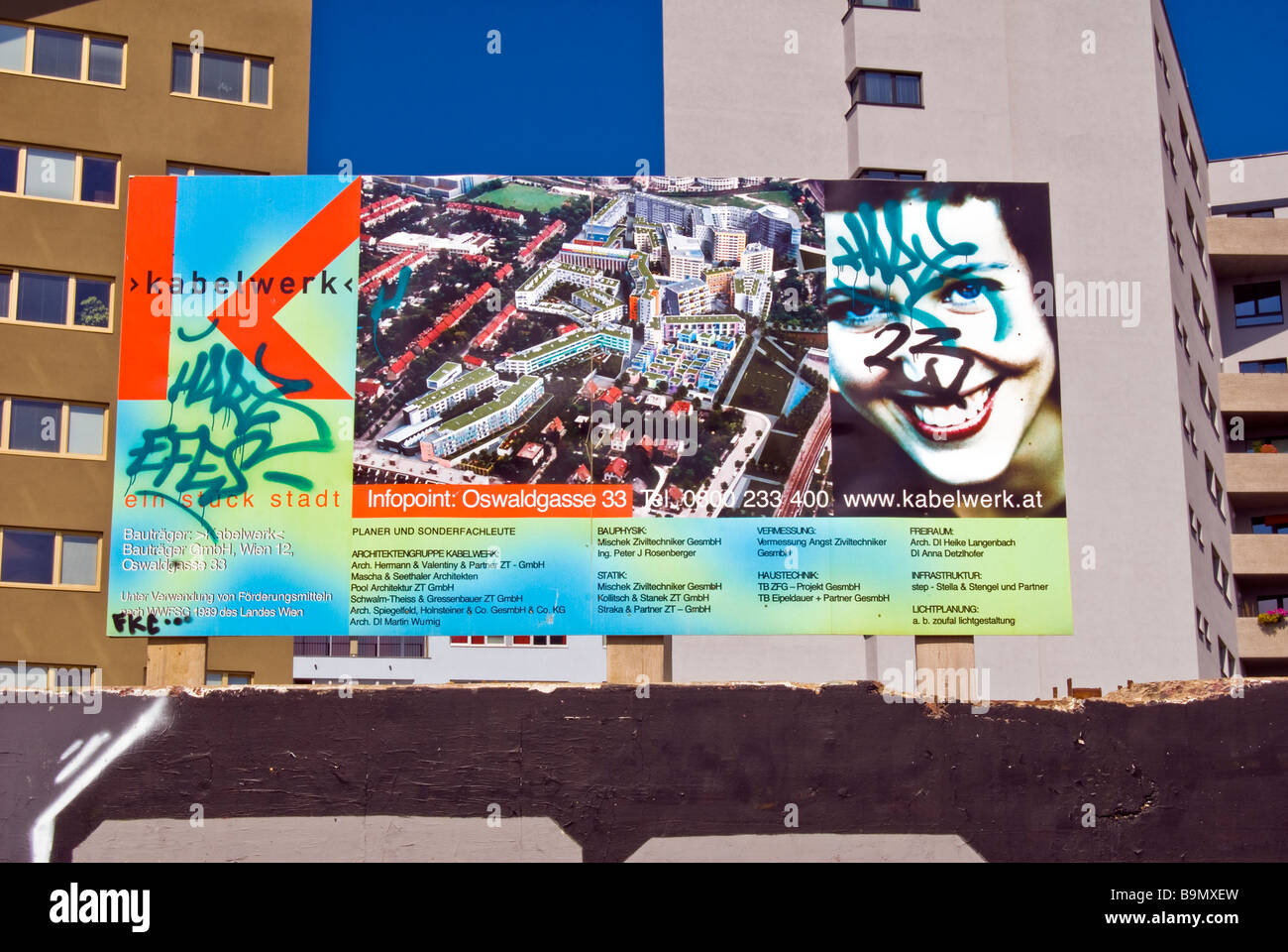 Poster layout of new housing site vandalised and graffitti sprayed Stock Photo