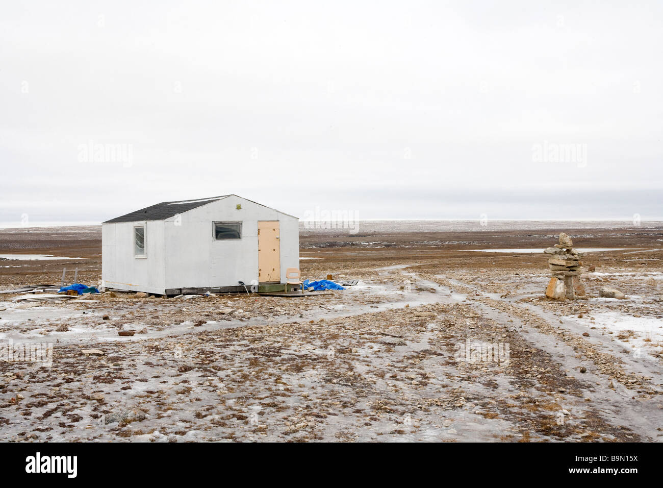 Unfinished shed building in coastal landscape, Canadian arctic, Canada Stock Photo